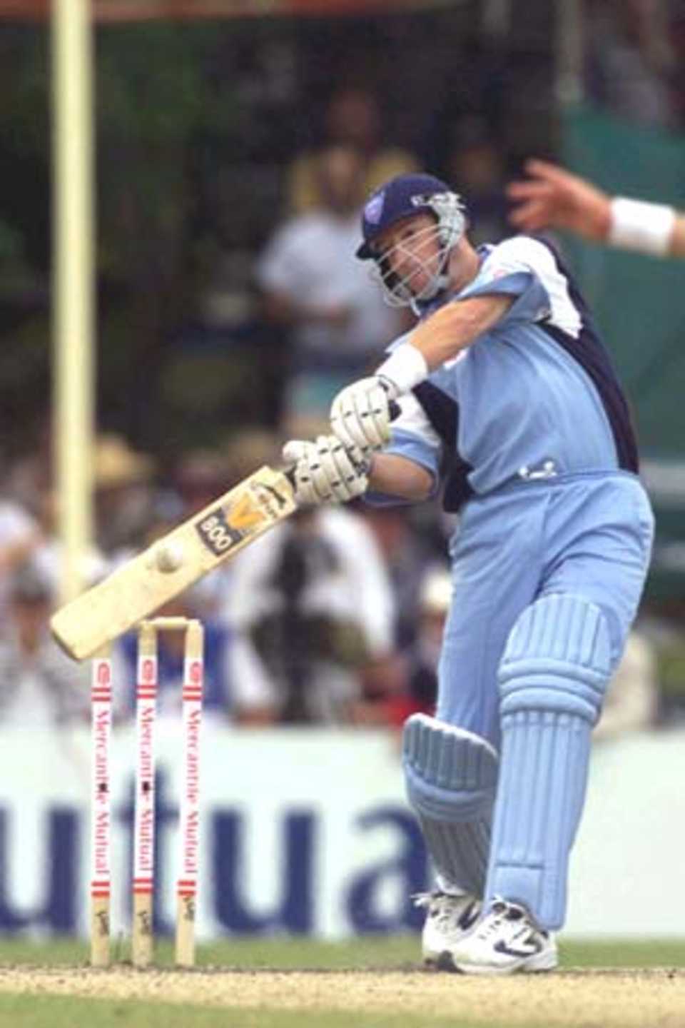 22 Oct 2000: Mark Waugh of New South Wales hits out during the Mercantile Mutual Cup match between NSW and OLD played at Bankstown Oval, Sydney, Australia.