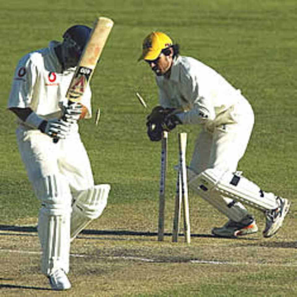 PERTH - OCTOBER 30: Mark Butcher of England is stumped by Ryan Campbell of Western Australia during day three of the three day tour match between England and Western Australia played at the WACA in Perth, Australia on October 30, 2002.