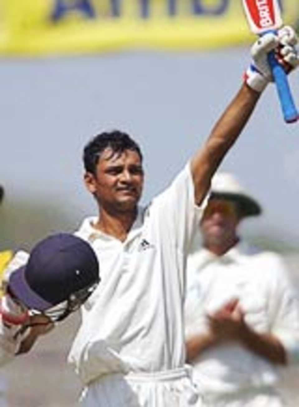 Hemang Badani celebrates his century for India A against New Zealand on the third day of their tour match at Rajkot