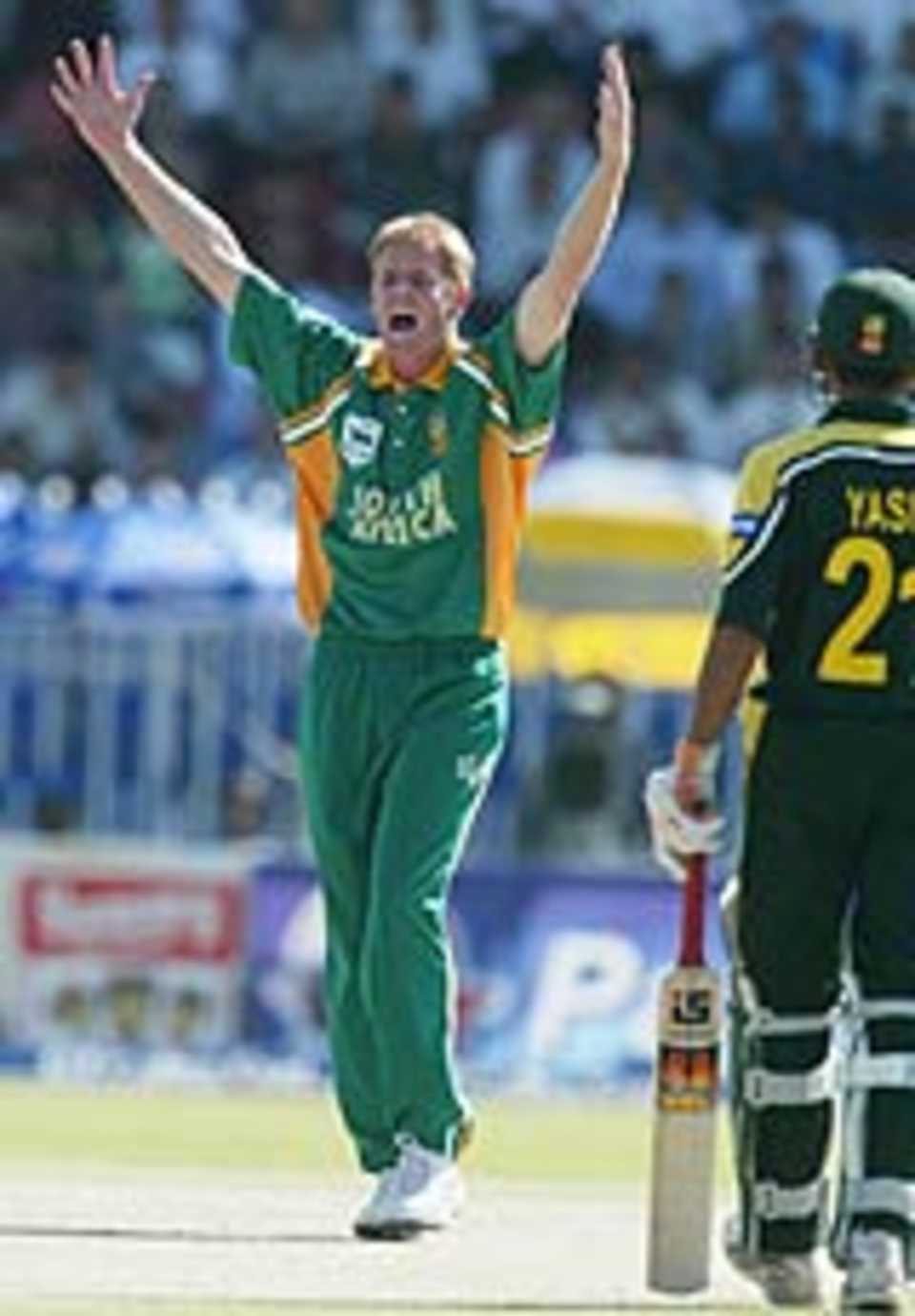 Shaun Pollock celebrates trapping Yousuf Youhana lbw for a duck, Pakistan v South Africa, 5th ODI, Rawalpindi, October 12, 2003.