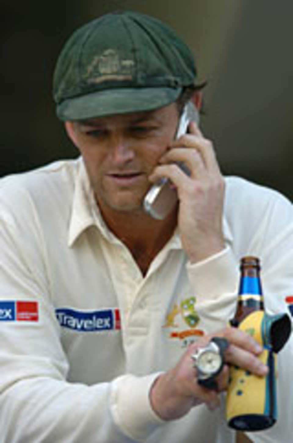 Adam Gilchrist makes a call, India v Australia, 1st Test, Bangalore, 5th day, October 10, 2004