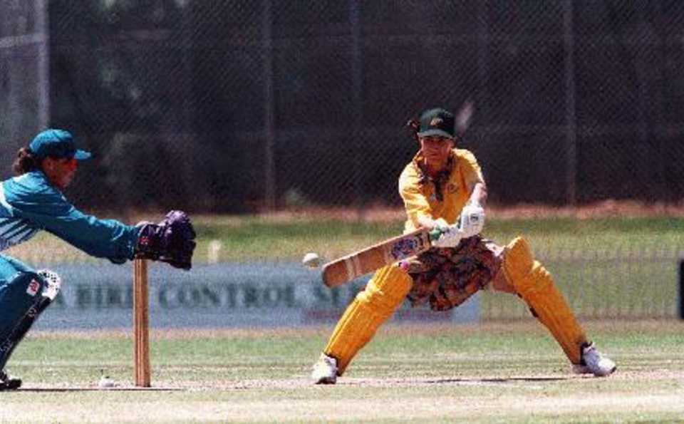 Australian captain Belinda Clarklate cuts away from the keeper's gloves. Aust v NZ Womens 2nd ODI at Bankstown Oval, 7 Nov 1997.
