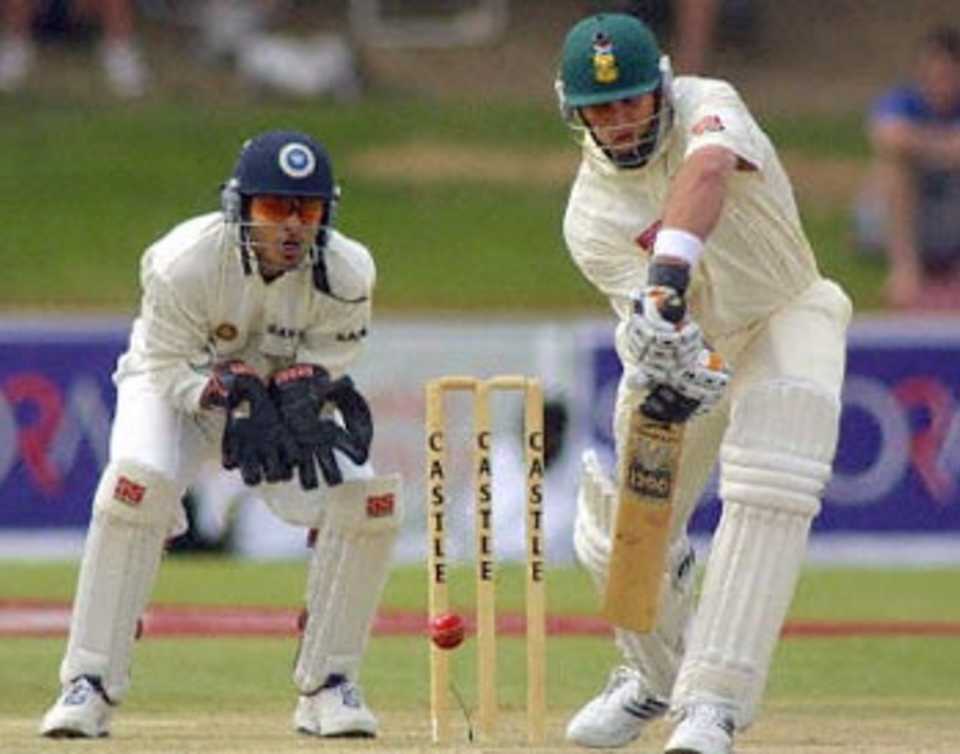 Jacques Kallis defends a delivery from Kumble