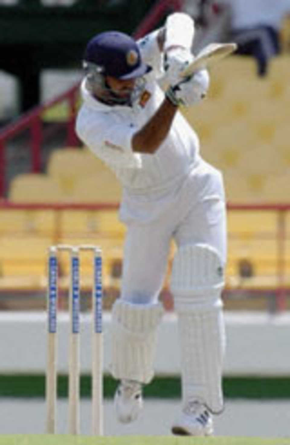 Marvan Atapattu driving West Indies bowler Corey Collymore during the first test match v West Indies at Beausejour Stadium, St. Lucia