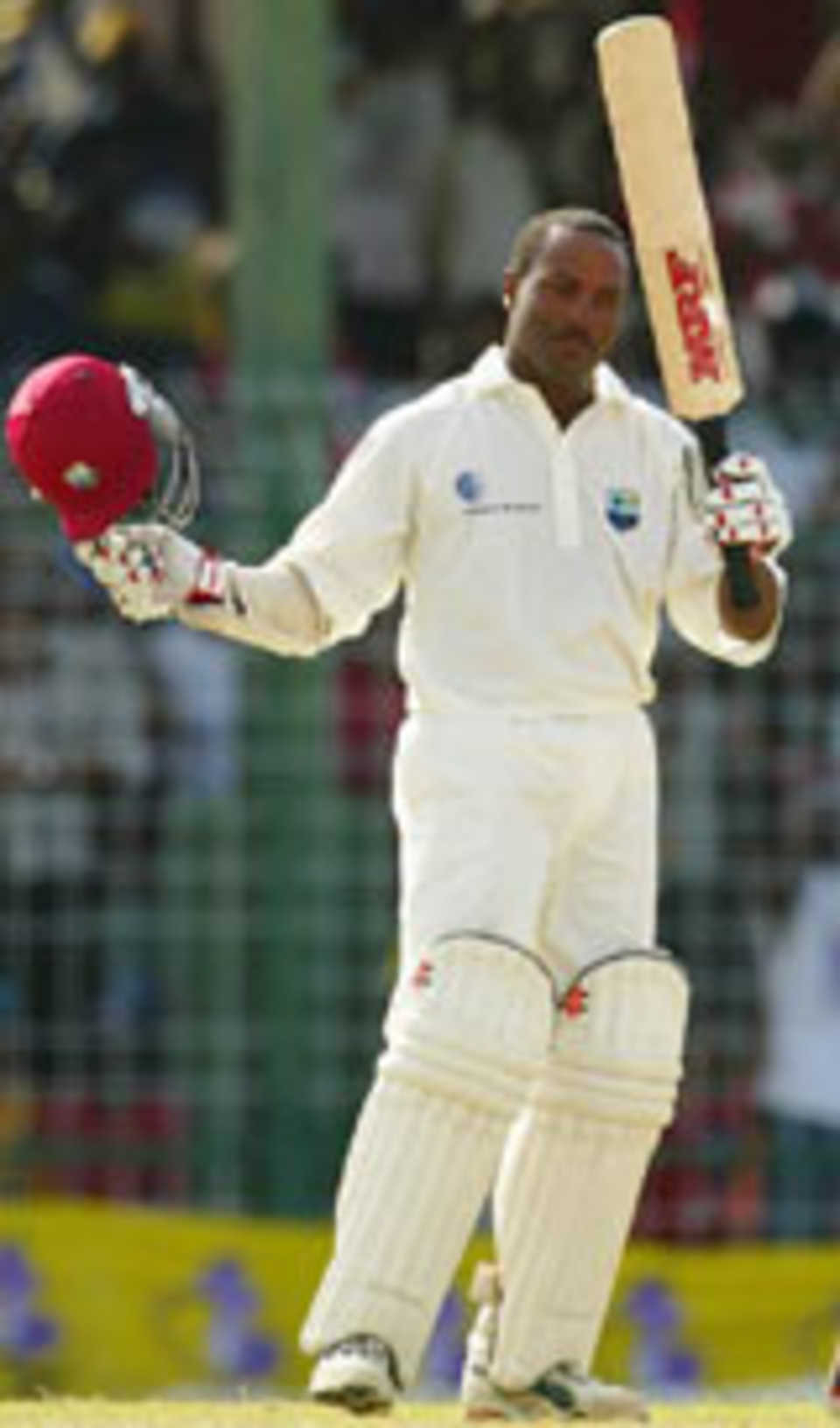 Brian Lara of the West Indies reaches 100 during day three of the 1st Test between the West Indies and Australia played on April 12, 2003 at Bourda Oval, Georgetown