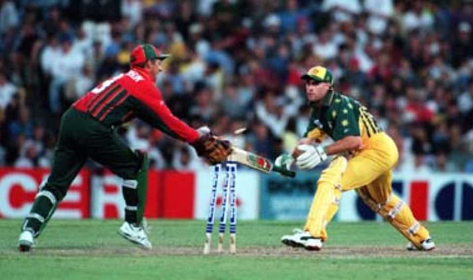 Richardson stumps Bevan off Symcox... Australia v South Africa, 1st ODI at the SCG, Thursday November 4th 1997