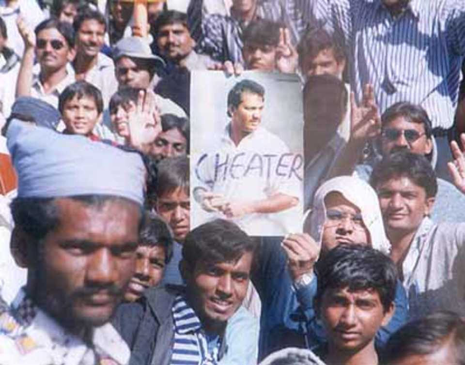 Supporters displaying the banner of Azharuddin after his life ban, Zimbabwe in India, 2000/01, 2nd One-Day International, India v Zimbabwe, Sardar Patel (Gujarat) Stadium, Motera, Ahmedabad, 05 December 2000.