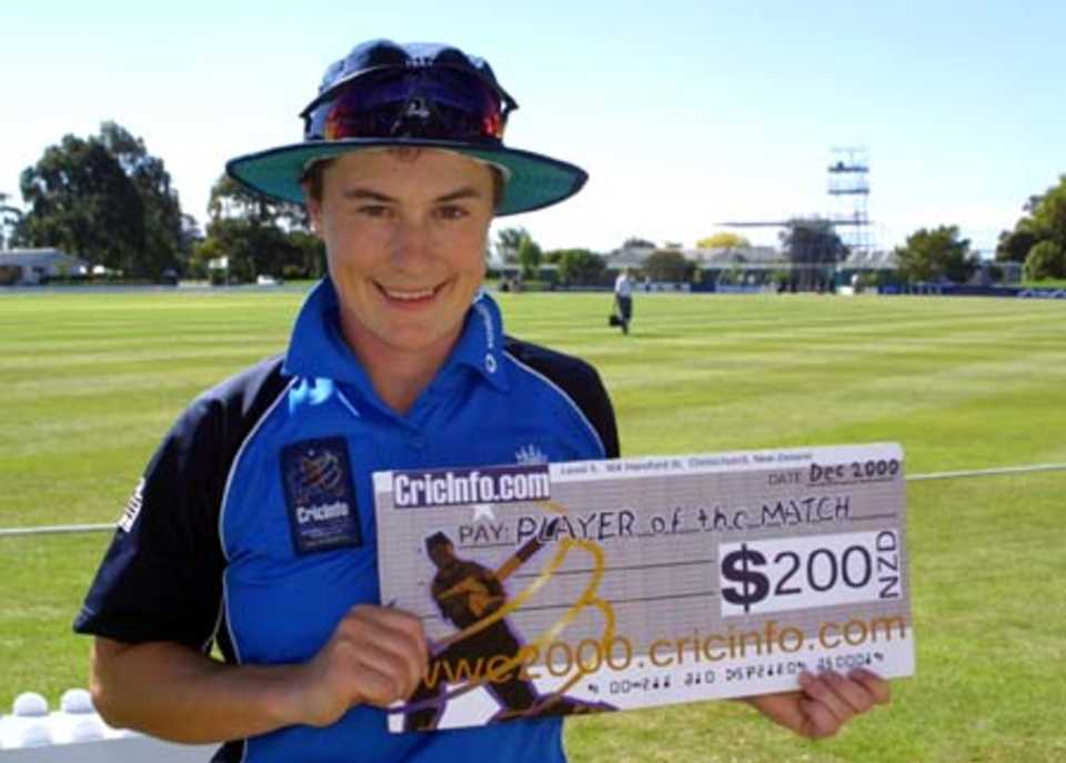 Player of the Match Claire Taylor with her cheque