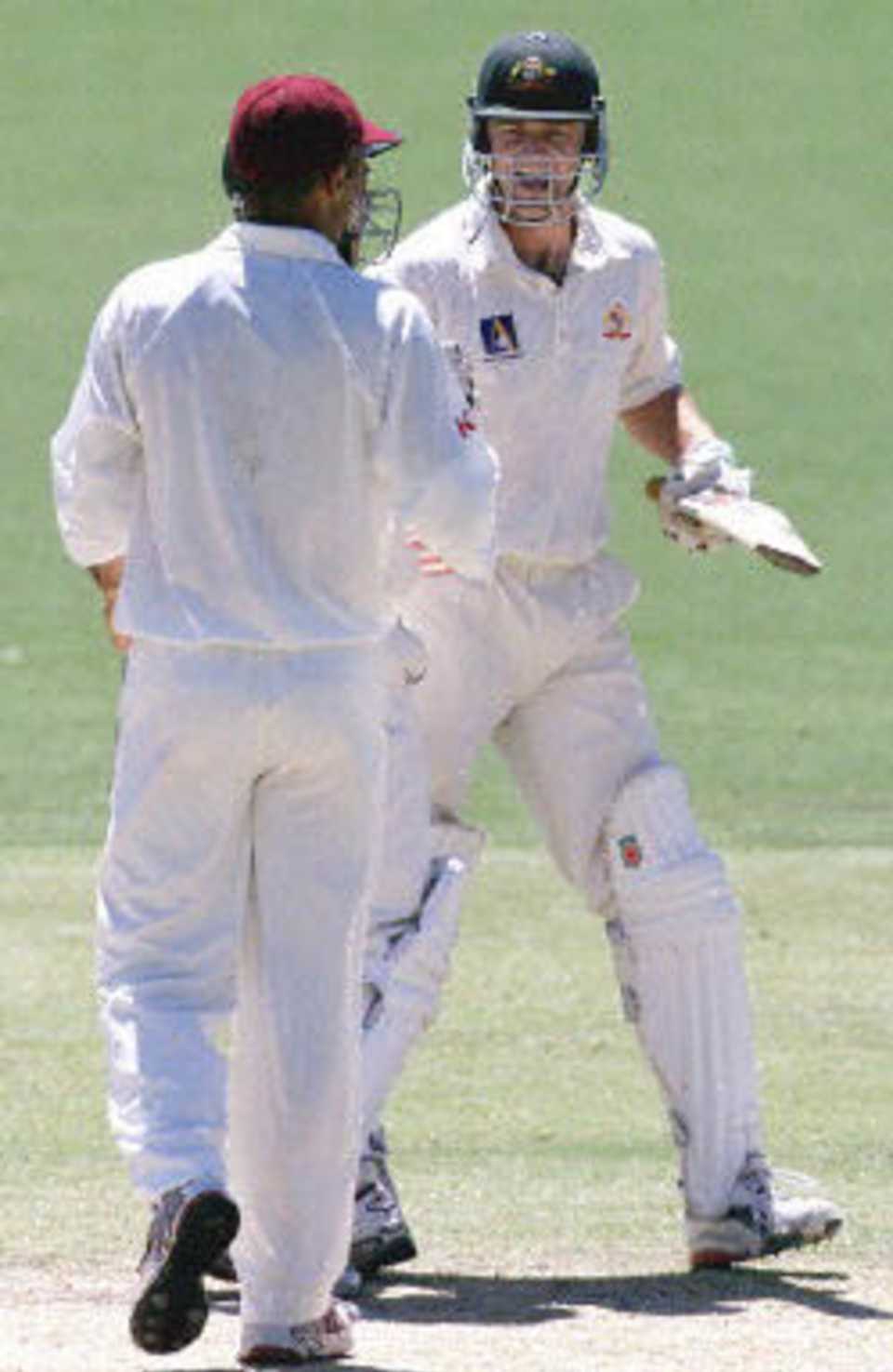 Gilchrist being congratulated by his counterpart Jimmy Adams