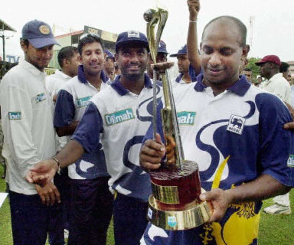 Skipper Sanath Jayasuriya celebrates with his teammates with the Janashakthi National trophy
