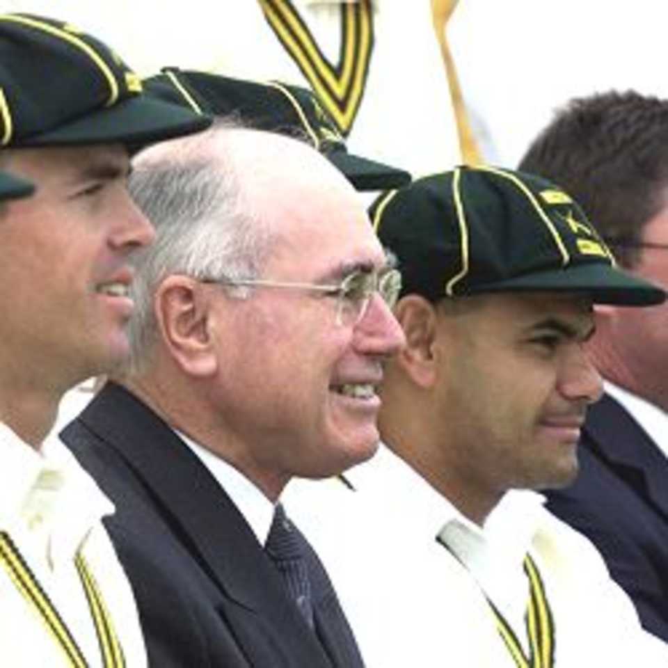 6th Dec 2001: The Prime Minister of Australia John Howard poses for photos with his team prior to their match against New Zealand being played at Manuka Oval ,Canberra,Australia. X Digital Image.