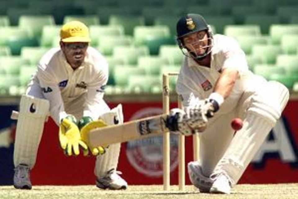 10 Dec 2001: Jaques Kallis of South Africa prepares to sweep, during day four of the four day tour match between Western Australia and South Africa, played at The WACA, Perth, Australia.