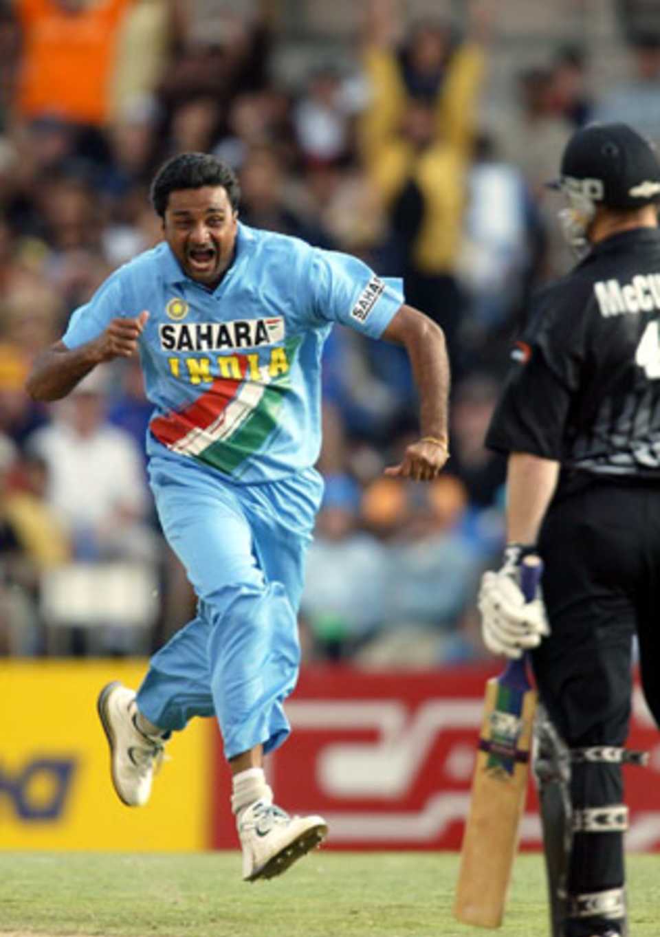 Indian bowler Javagal Srinath celebrates the dismissal of New Zealand batsman Brendon McCullum, caught by wicket-keeper Rahul Dravid for four. 1st ODI: New Zealand v India at Eden Park, Auckland, 26 December 2002.