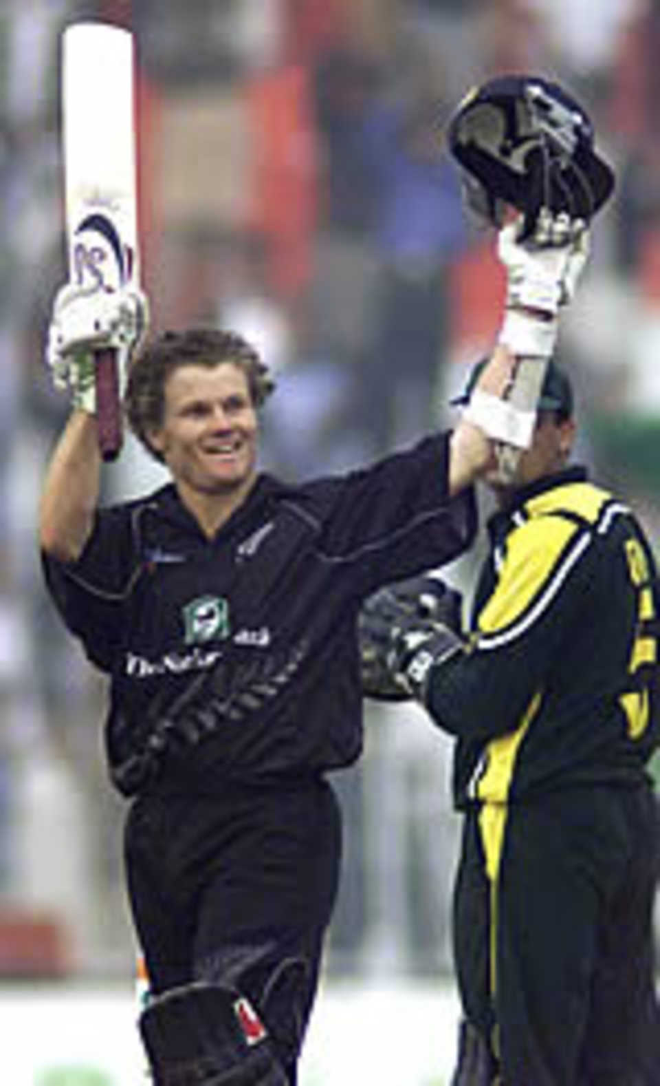 Hamish Marshall acknowledges his 101 not out, Pakistan v New Zealand, 3rd ODI, Faisalabad, December 3, 2003.