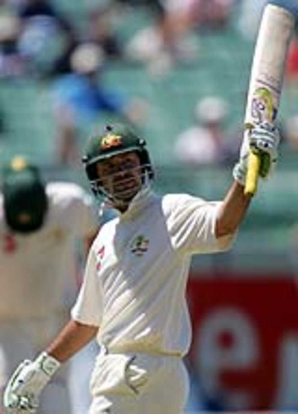 Ricky Ponting acknowledges after reaching his fifty