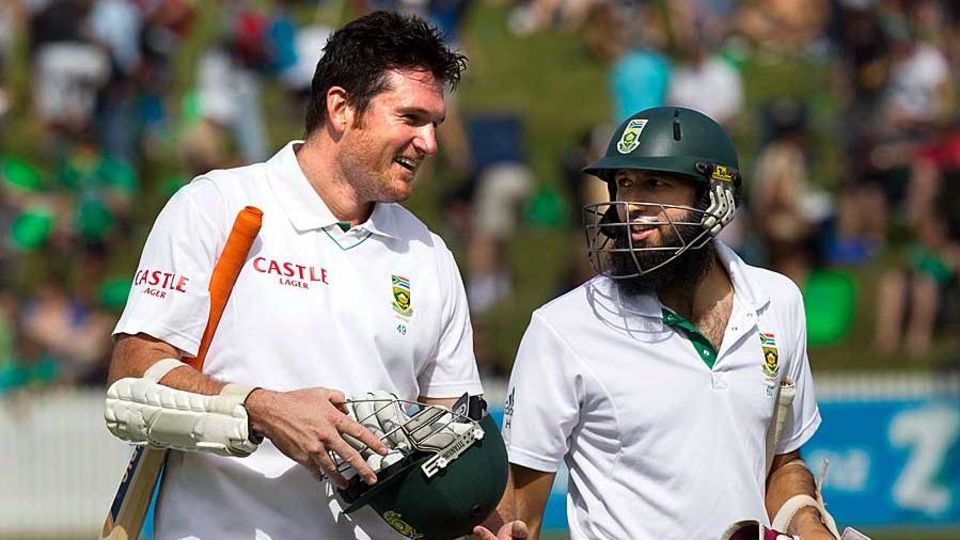 Graeme Smith walks back with Hashim Amla after taking his team to a win, New Zealand v South Africa, 2nd Test, Hamilton, 3rd day, March 17, 2012