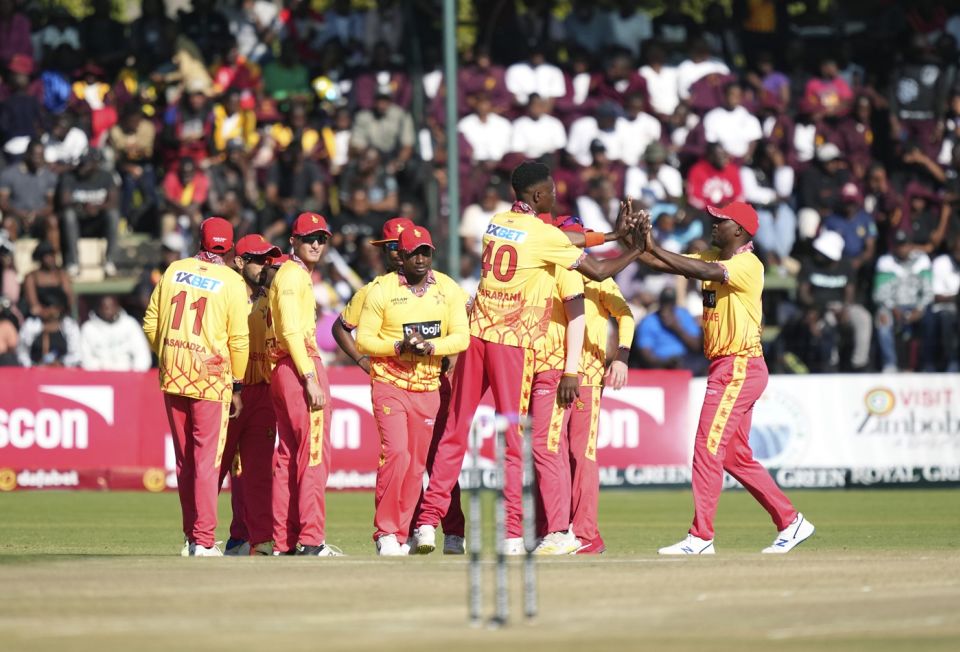 Blessing Muzarabani celebrates a wicket with his team-mates, Zimbabwe vs India, 1st T20I, Harare, July 6, 2024