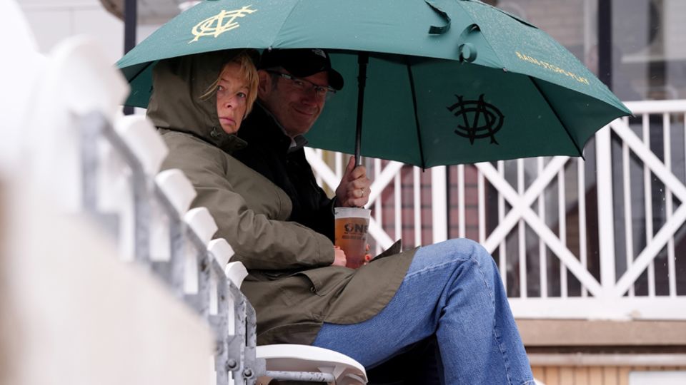 A couple shelter from the rain at Trent Bridge, England vs South Africa, 3rd Men's T20I, Trent Bridge, Nottingham, September 14, 2025