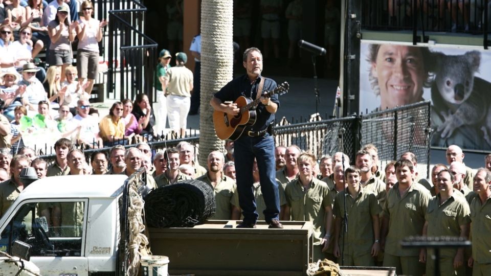 John Williamson, pictured here performing at Steve Irwin's memorial service, will sing 'True Blue' at Adelaide Oval on the opening day of the Test, Sunshine Coast, September 20, 2006