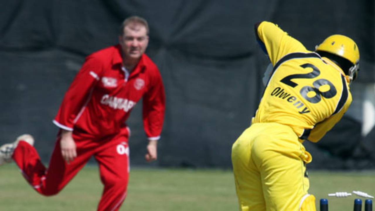 Uganda's Joel Olwenyi is bowled by Morten Hedegaard