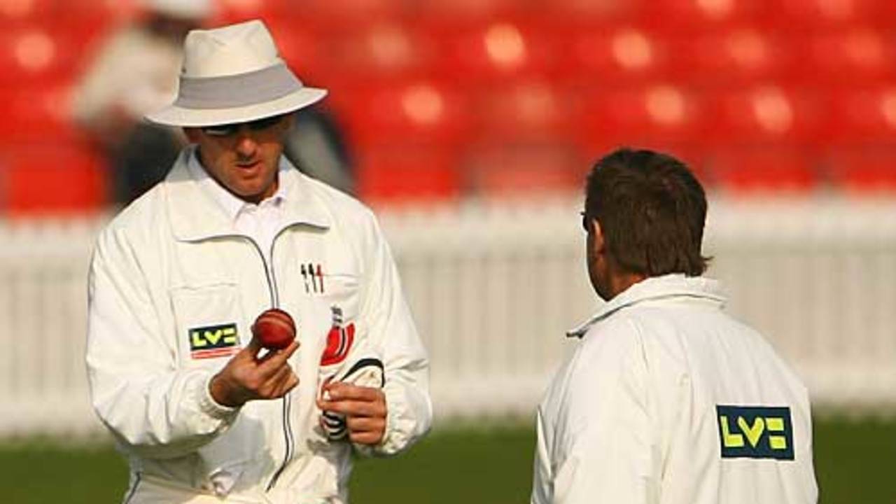 Umpires Michael Gough and Trevor Jesty inspect the Tiflex ball that will be used in Division Two, Leicestershire v Northamptonshire, County Championship Division Two, Grace Road, April 15, 2009