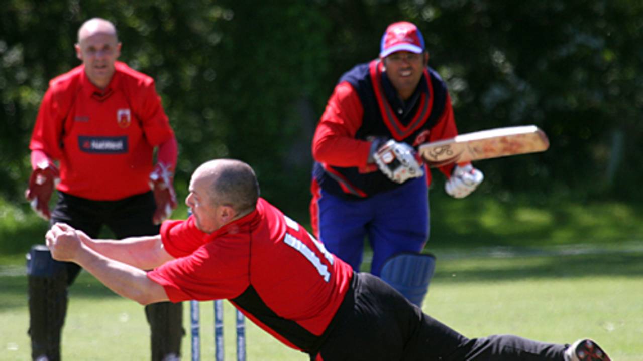 Rex Purnell takes a catch off his own bowling to dismiss Zaheer Zafar, Bahrain v Gibraltar, ICC World Cricket League Division 7, Castel, May 19, 2009