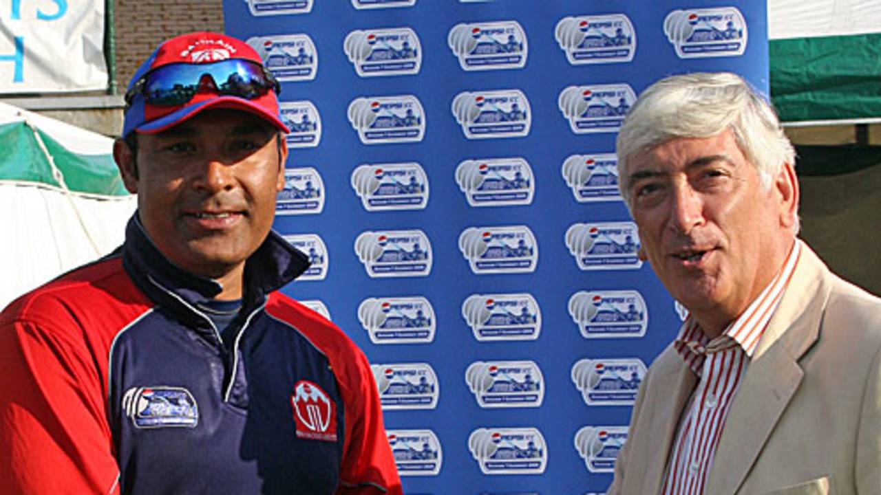 Qamar Saeed receives the Man-of-the-Match award for his all-round show