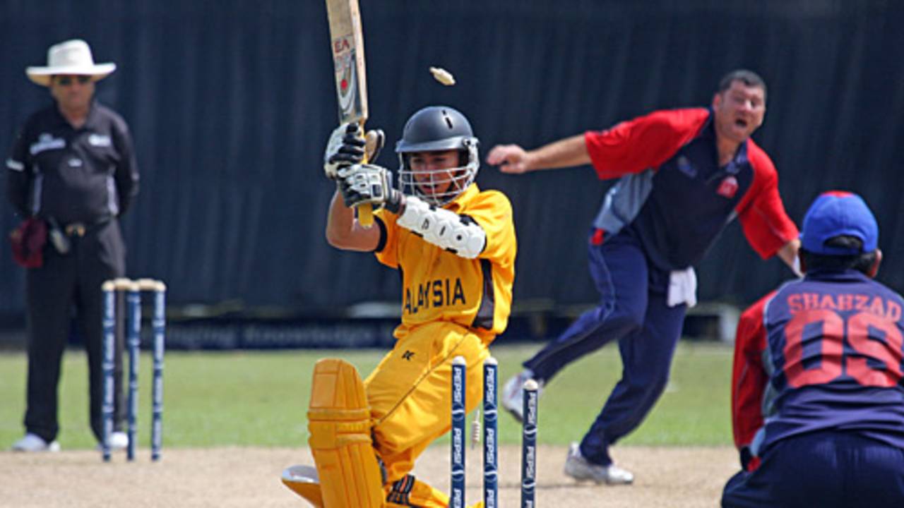 Halal Abbasi bowls Faris Almas for 25, Bahrain v Malaysia, ICC World Cricket League Division Six, Singapore, August 29, 2009