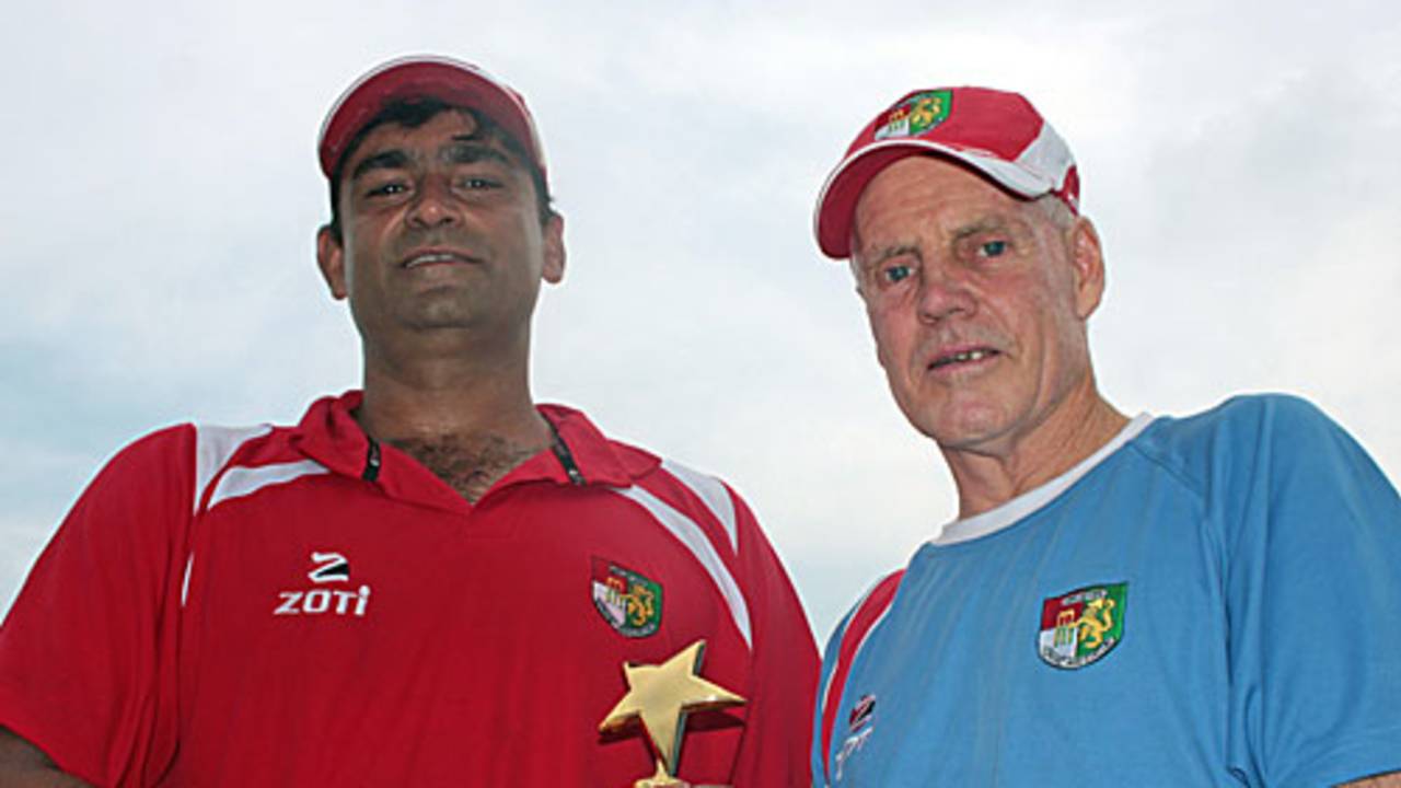 Man of the Match Saad Janjua is congratulated by Singapore coach Trevor Chappell