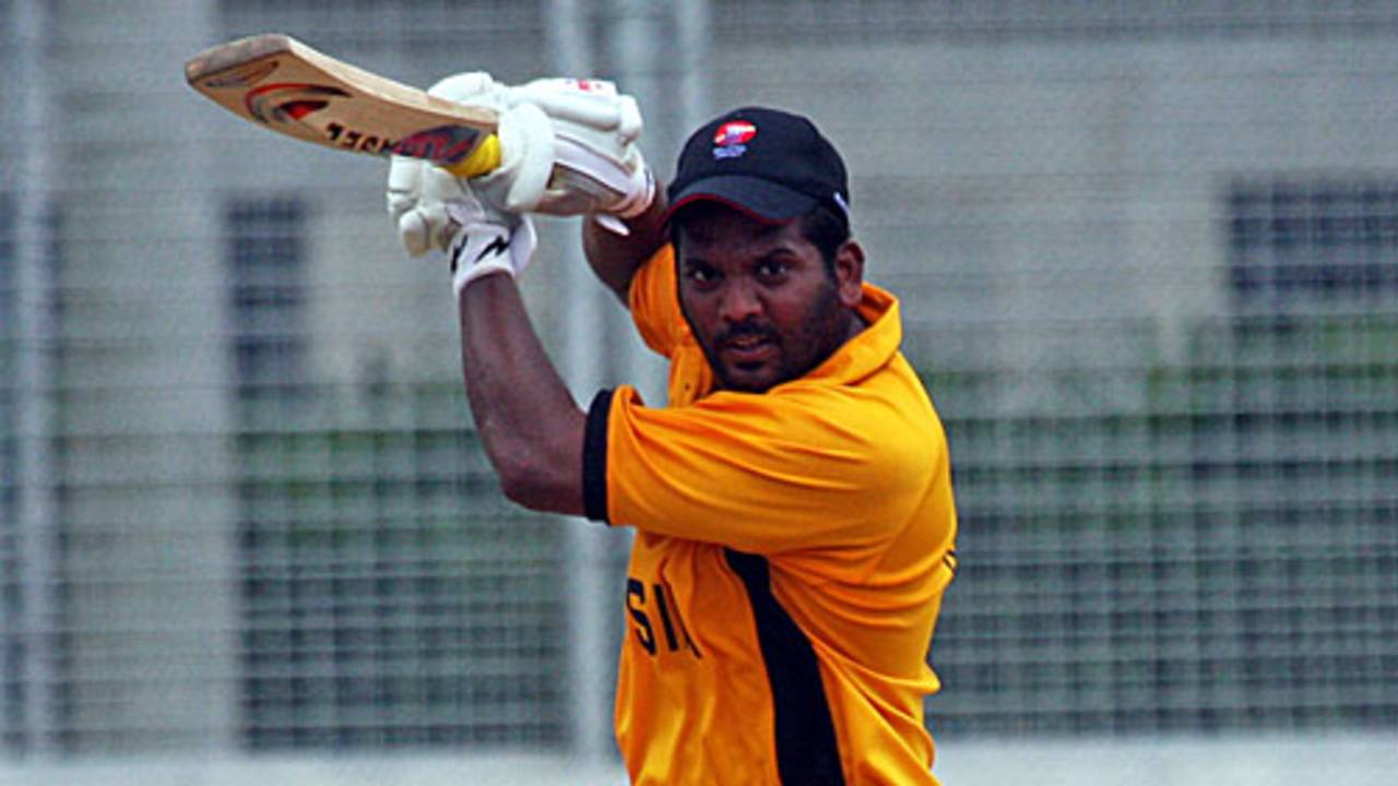 Malaysia's Rakesh Madhavan plays a stylish punch through the off side, Malaysia v Norway, ICC World Cricket League Division 6, Singapore, August 31, 2009 