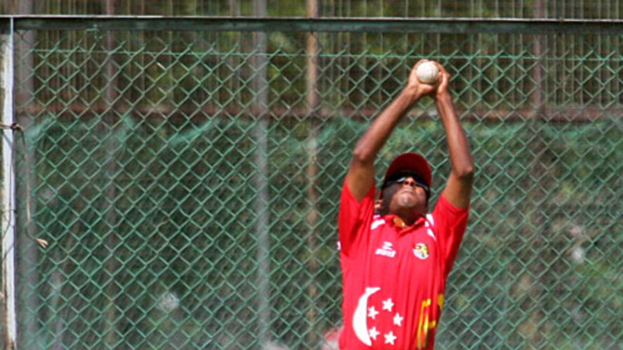 Riaz Hussien  takes a catch to dismiss Zaheer Ashiq, Singapore v Norway, ICC World Cricket League Division 6, Singapore, September 2, 2009
