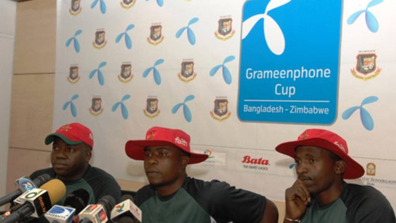 Zimbabwe team manager Walton Kafesu, captain Prosper Utseya and coach Walter Chawaguta at a media briefing 
