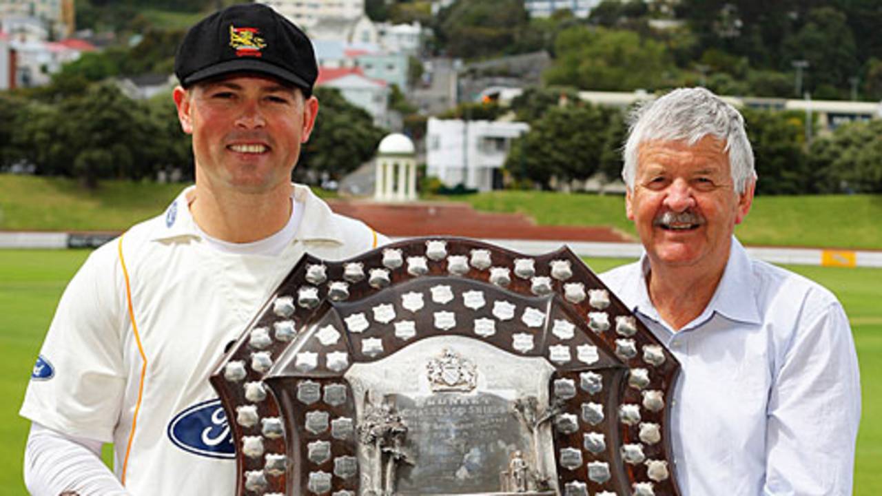 Wellington captain Matthew Bell and Glenn Turner pose with the Plunket Shield