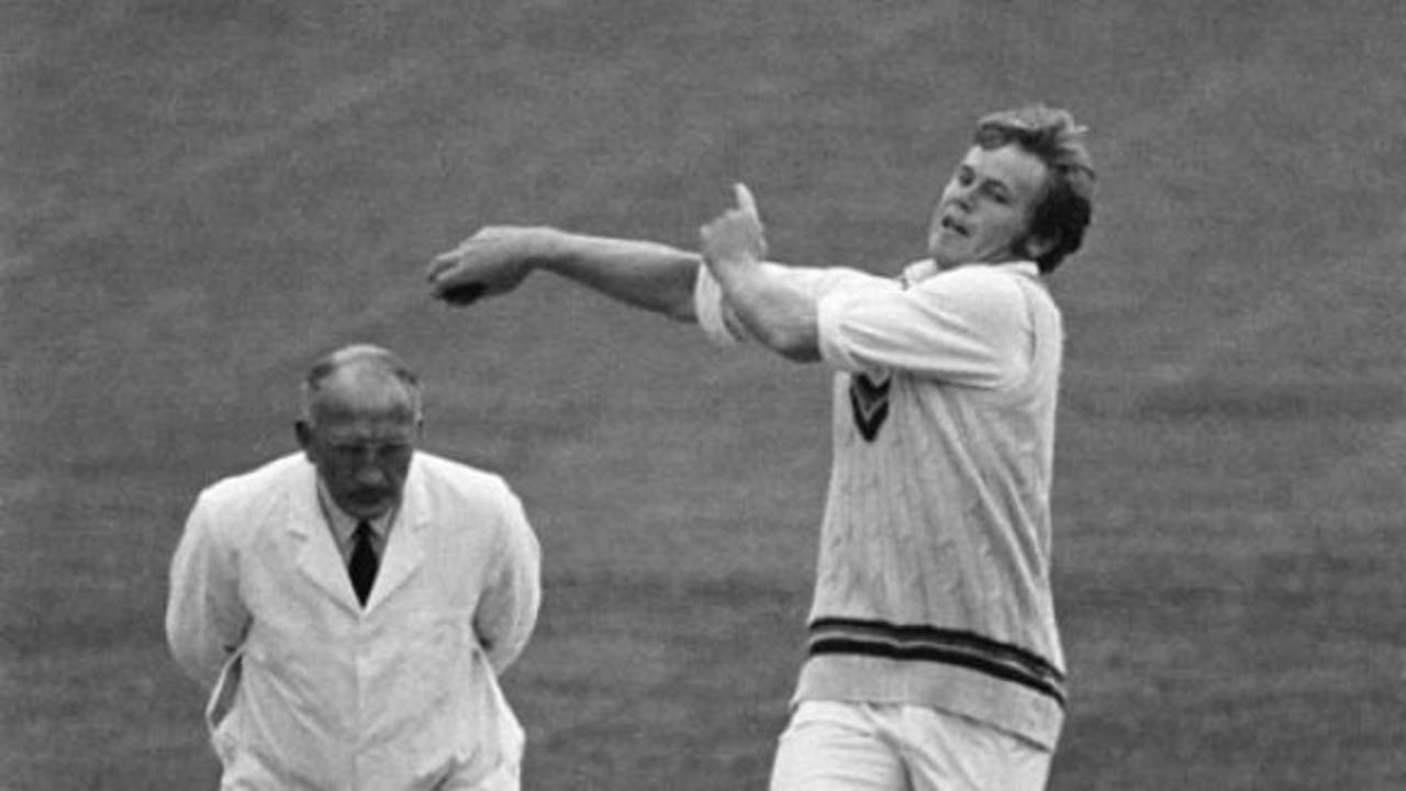 Mike Procter bowling as umpire Tom Spencer looks on, Gloucestershire v Northamptonshire, County Ground, Northampton, 21 June 1971
