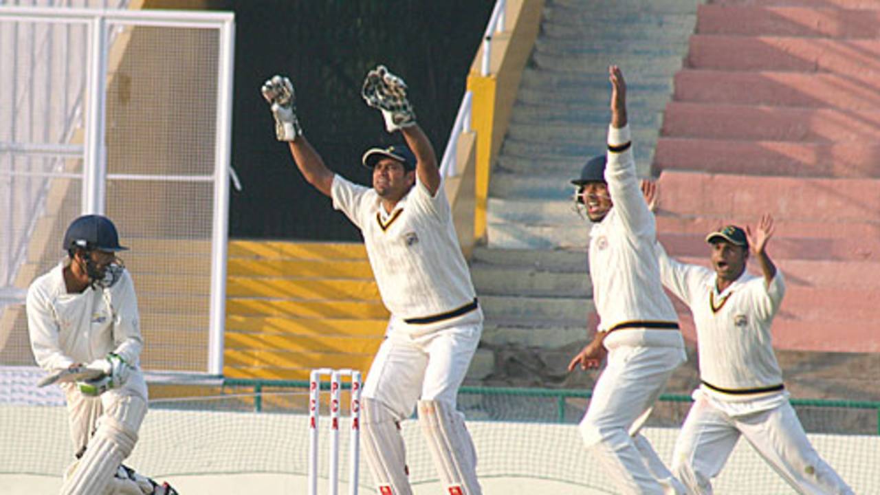 Ajay Mannu is trapped leg before by Manpreet Gony, Punjab v Himachal Pradesh, Ranji Trophy Super League, Group A, Mohali, 2nd day, December 2, 2009