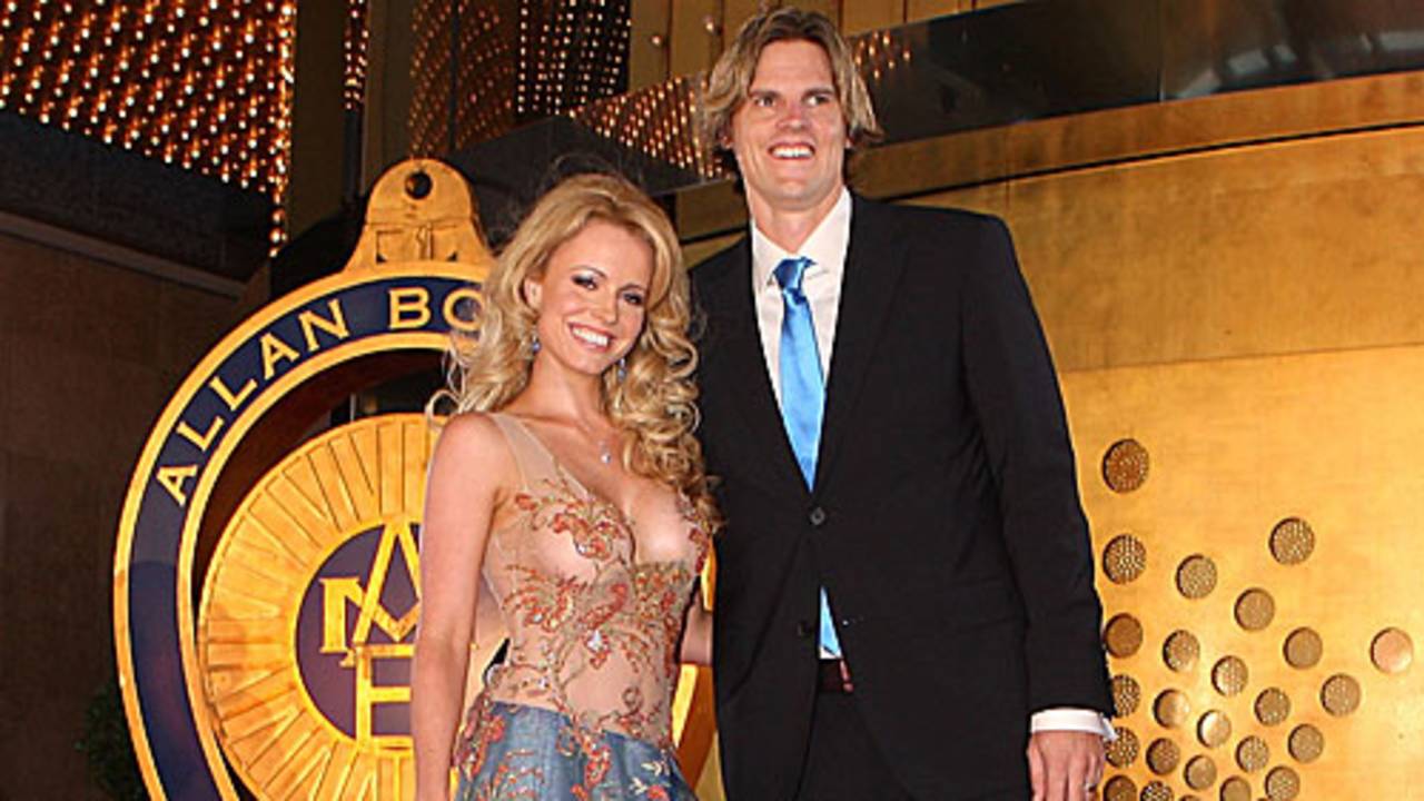 Nathan Bracken poses with his wife Haley