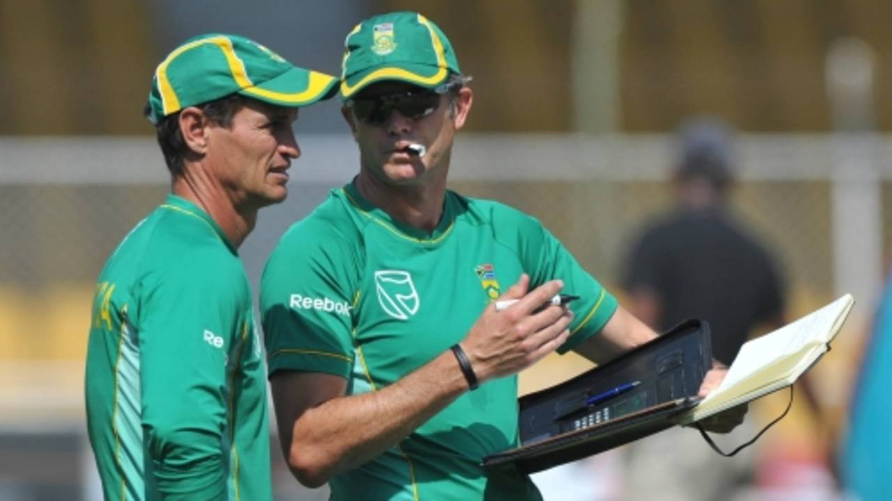 Kepler Wessels and Corrie van Zyl in discussion during South Africa's training session, Ahmedabad, February 26, 2010