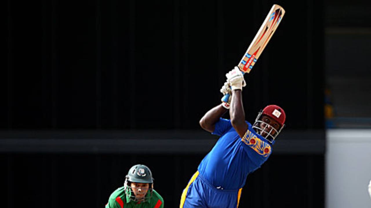 Martin Nurse goes over the top, Barbados v Bangladesh, ICC World Twenty20 warm-up, Kensington Oval, April 27, 2010 