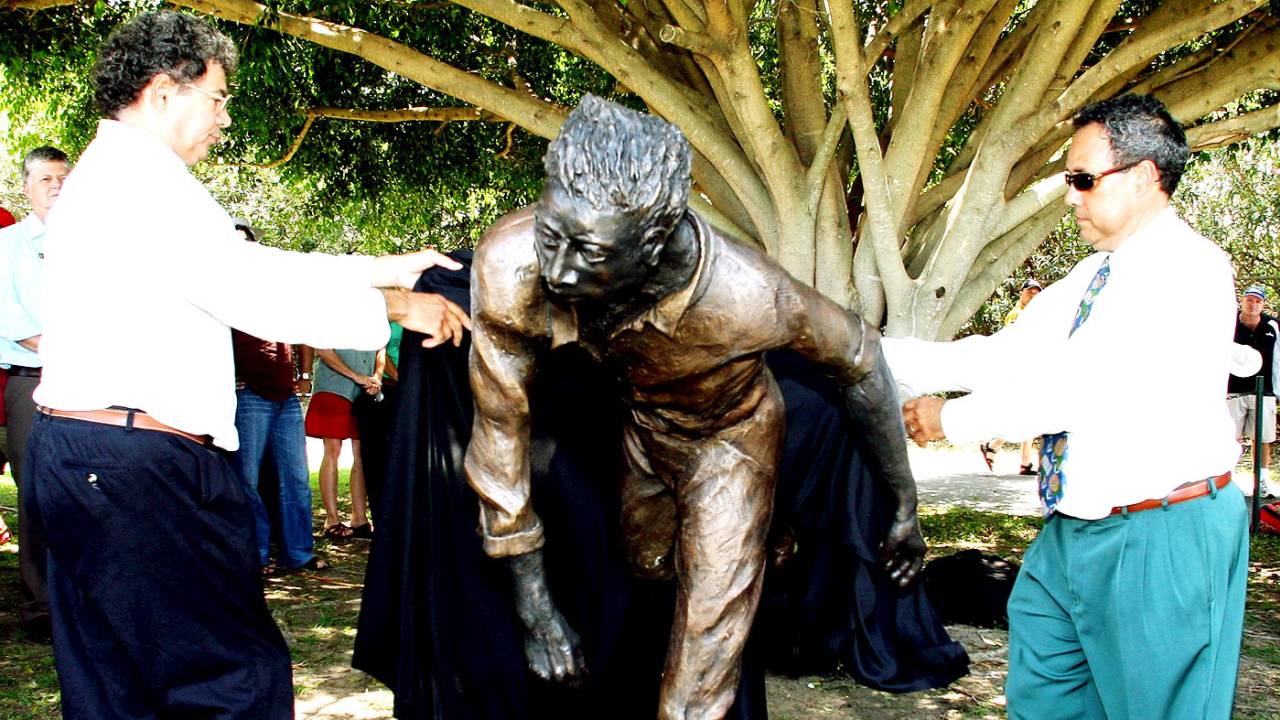 Wayne Coolwell and Larry Budd unveil a statue of Aboriginal cricketer Eddie Gilbert, Allan Border Field, Brisbane, November 16, 2008