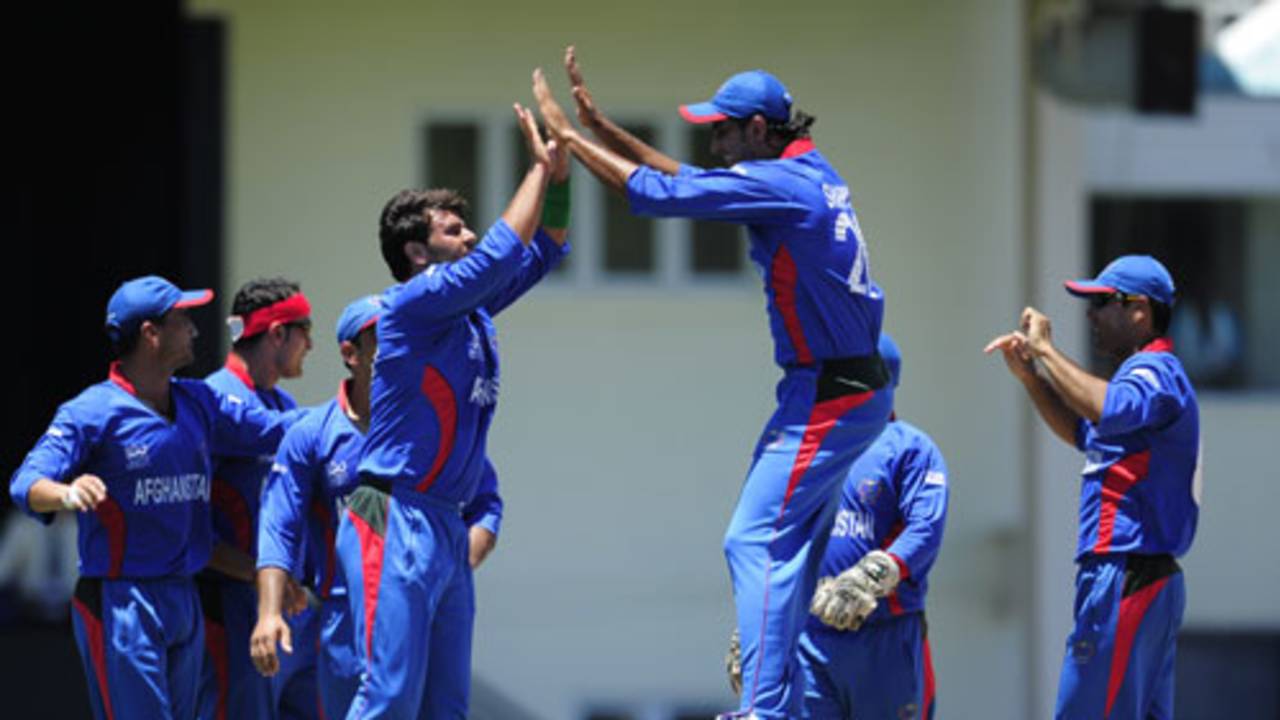 Dawlat Ahmadzai celebrates the dismissal of Gautam Gambhir with his team-mates, Afghanistan v India, World Twenty20, Gros Islet, May 1, 2010