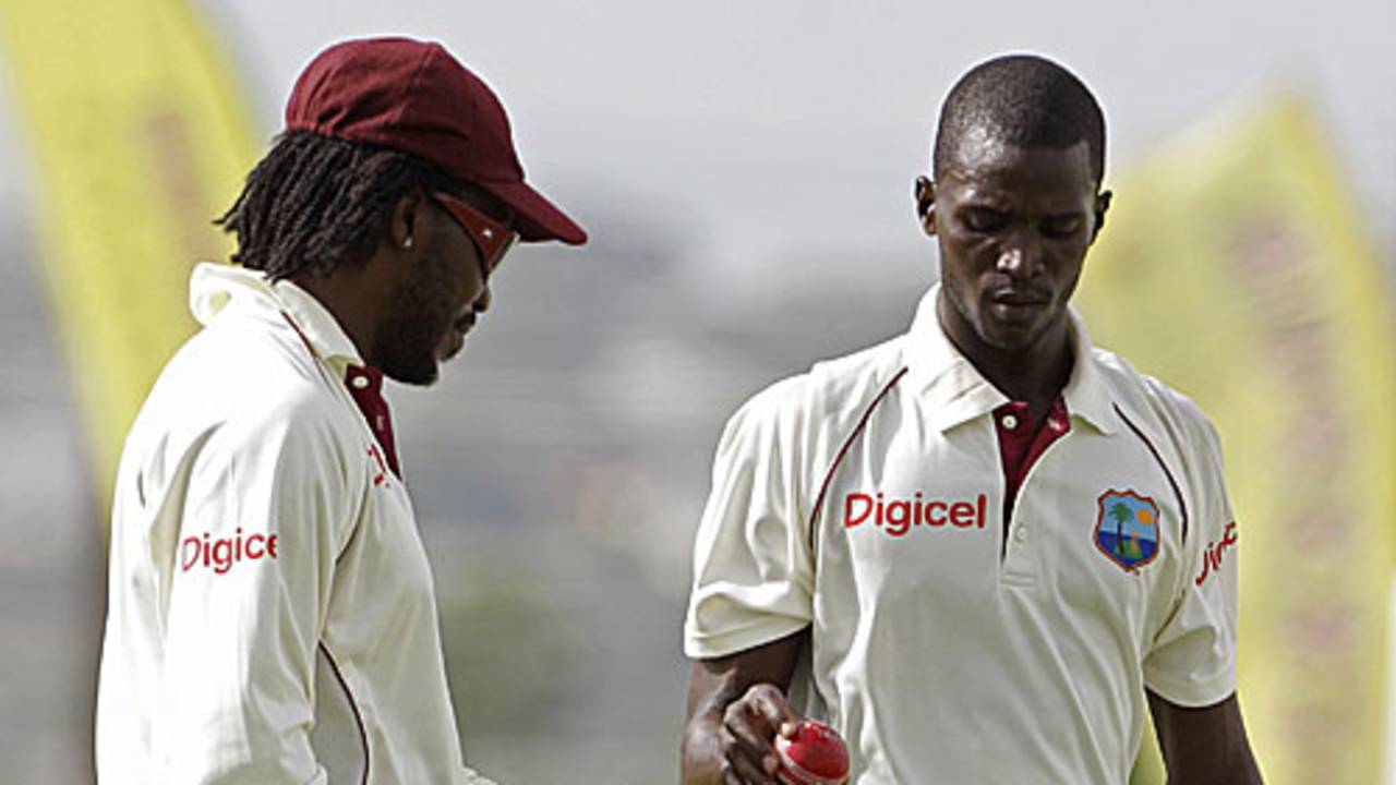 Chis Gayle with rookie fast bowler Brandon Bess