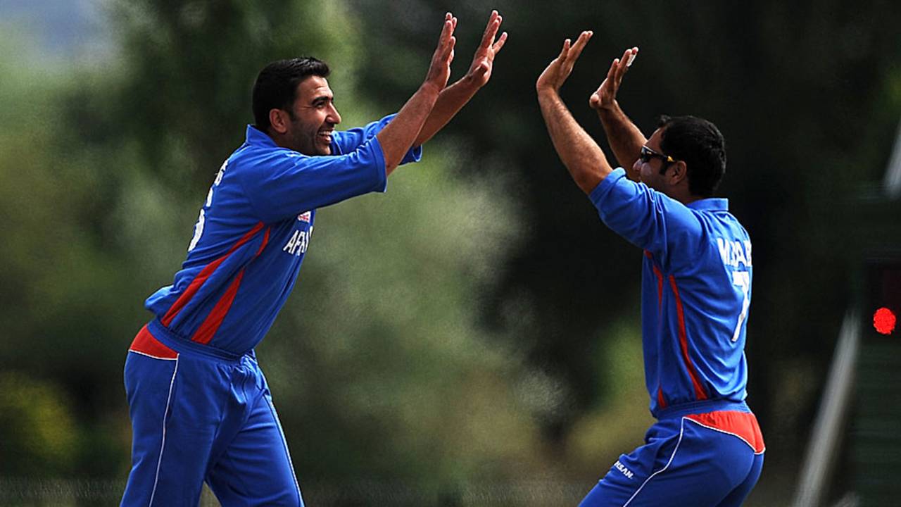 Khaliq Dad celebrates one of his three wickets