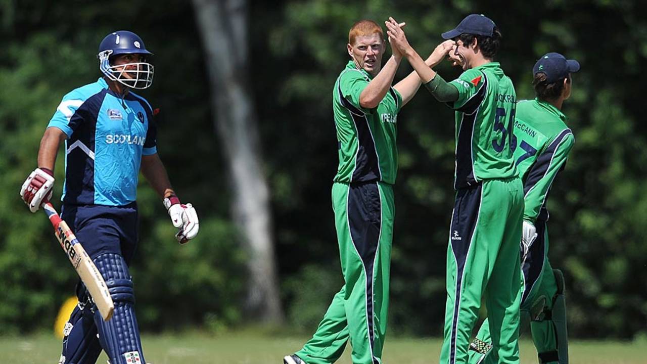 Kevin O'Brien celebrates the wicket of Omer Hussain