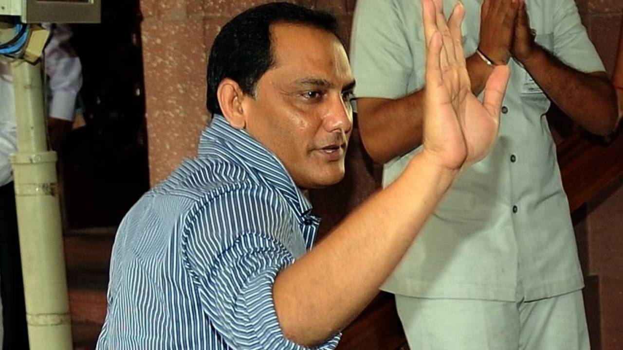 Former Indian captain and current MP Mohammad Azharuddin arrives for the monsoon session of the parliament, New Delhi, July 26, 2010