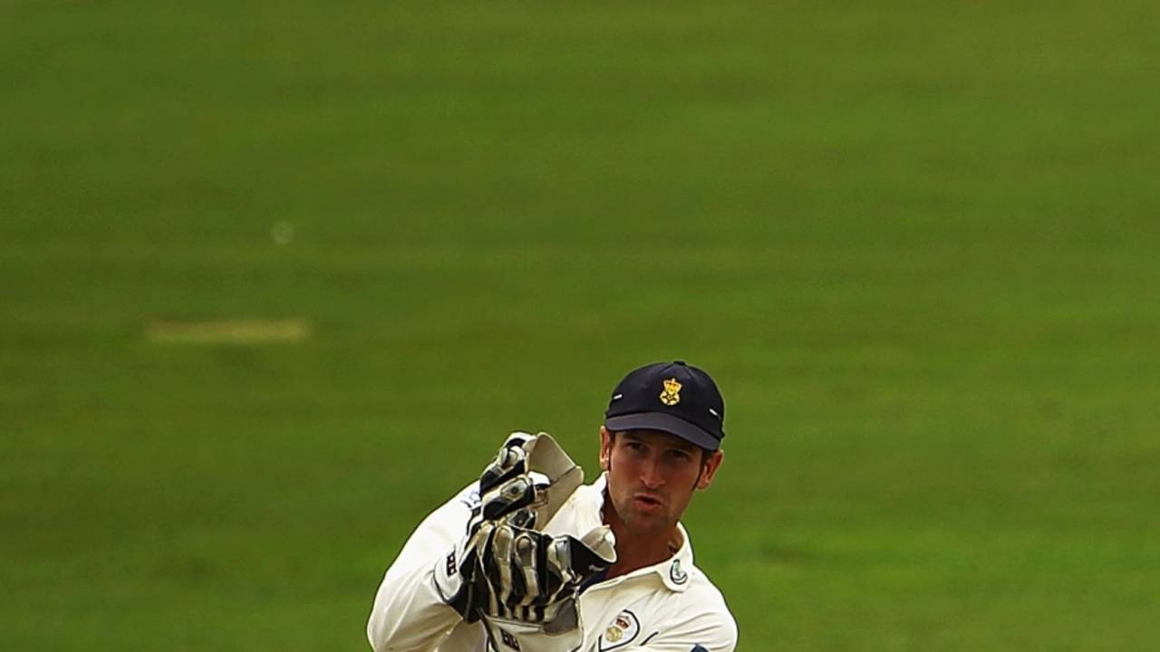 Lee Goddard keeps wicket during Australia's tour match against Derbyshire