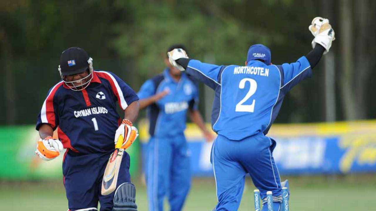 Pearson Best is run out for 85 by the Northcote brothers, Italy v Cayman Islands, ICC WCL Div. 4, Medicina, August 19, 2010