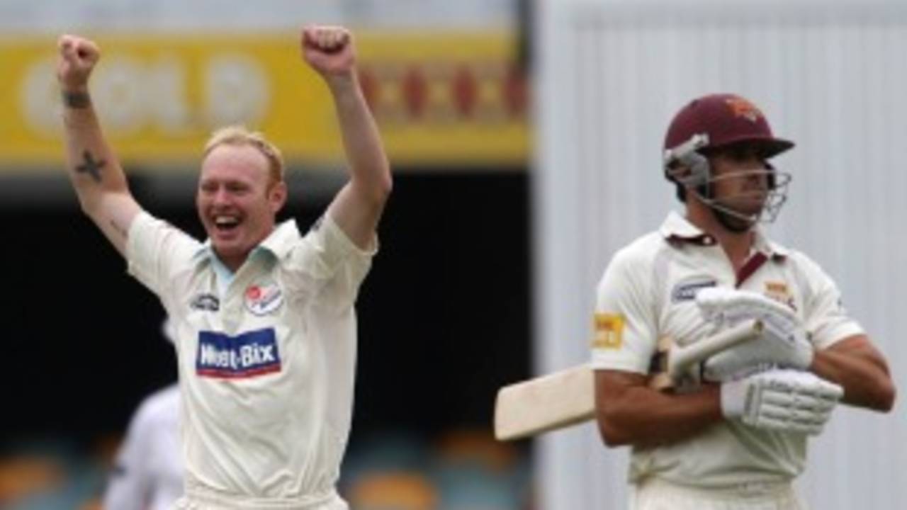 Scott Coyte celebrates after completing a hat-trick, Queensland v New South Wales, Sheffield Shield, Brisbane, 2nd day, November 1, 2010
