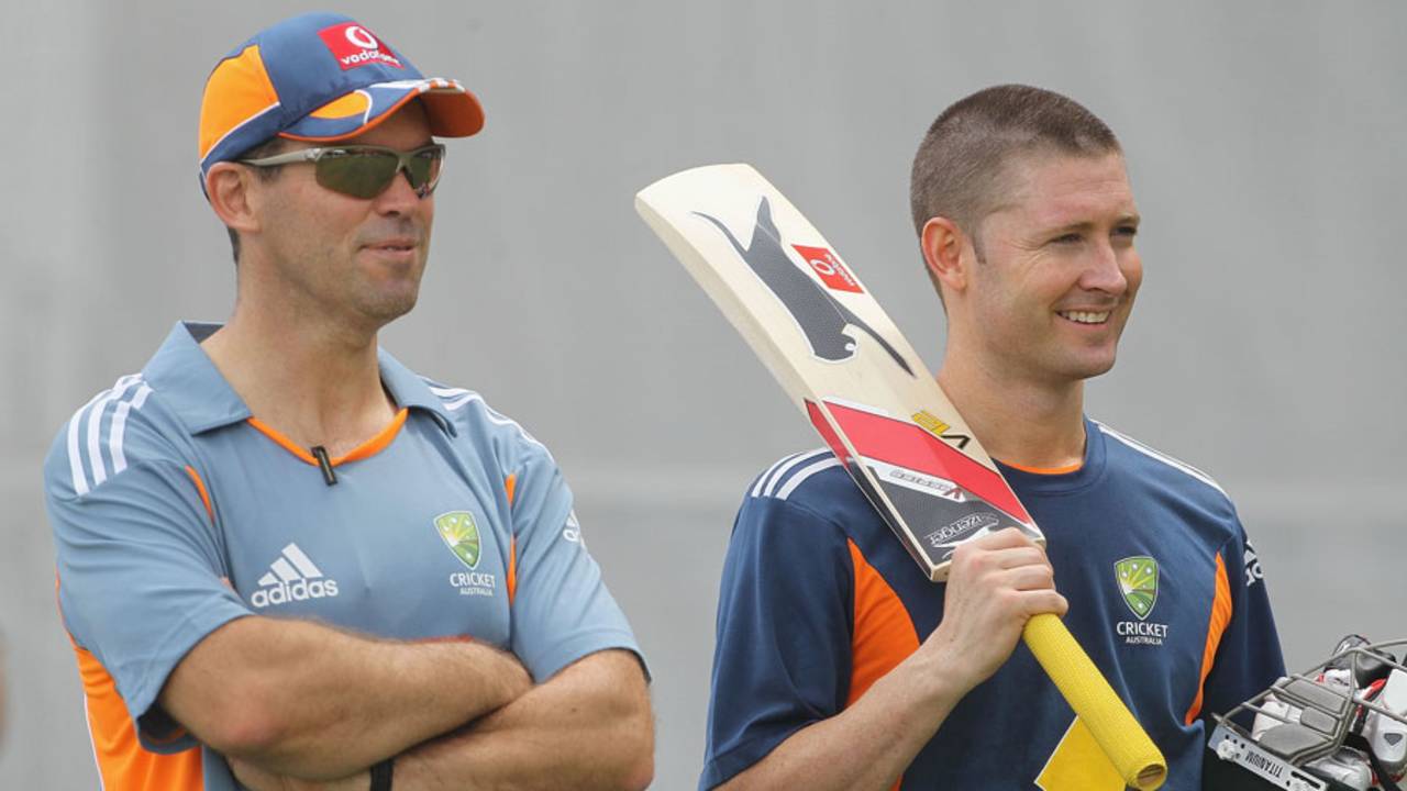 Assistant coach Dene Hills with Michael Clarke at Australia's training session