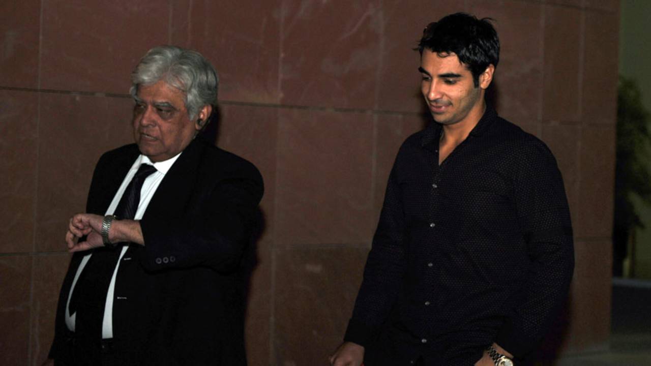 Salman Butt (right) leaves a hearing with his lawyer, Aftab Gul, following Butt's suspension on charges of spot-fixing, Dubai, October 30, 2010