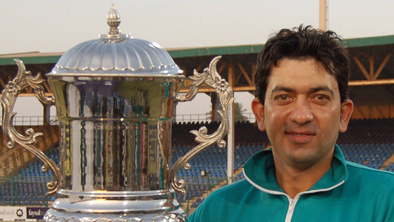 Hasan Raza, the HBL captain, poses with the winner's trophy, HBL v PIA, Quaid-e-Azam Trophy Division One Final, fifth day, Karachi, January 17, 2011